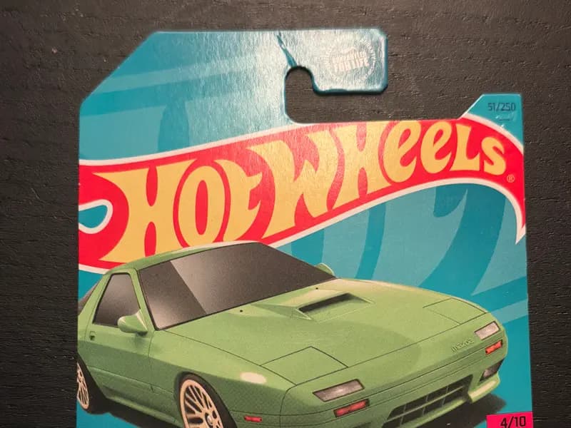 '89 Mazda Savanna RX-7 FC3S die-cast, a green mainline Hot Wheels casting